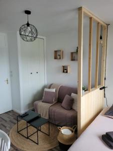 Appartements Studio plein centre-ville wifi : photos des chambres