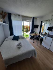 Appartements Studio 4 pers piscine-proche plage-Jumping : photos des chambres