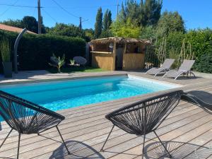 Maisons de vacances BELLE MAISON CONTEMPORAINE AVEC PISCINE CHAUFFEE : photos des chambres