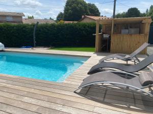 Maisons de vacances BELLE MAISON CONTEMPORAINE AVEC PISCINE CHAUFFEE : photos des chambres