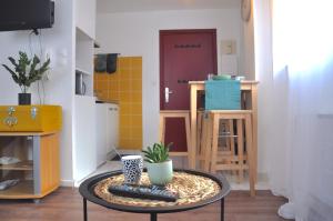 Appartements F1 tout equipe proche Tram - Jungle : photos des chambres