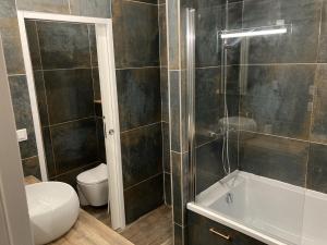 Maisons de vacances Kentan - Maison insolite intra-muros a Guerande : photos des chambres