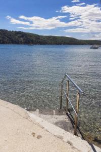 Apartments by the sea Kampor, Rab - 11407 