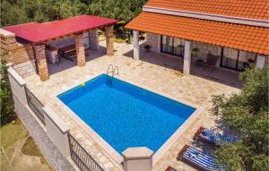 Awesome Home In Zrnovnica With Outdoor Swimming Pool, Jacuzzi And 2 Bedrooms