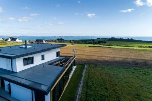 Villas Vue a Couper le Souffle - Villa de Charme avec Spa en Bord de Mer - Pointe Finistere : photos des chambres