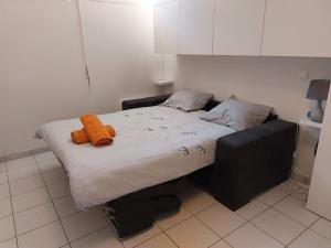 Appartements Charmant Studio La Ville Du Bois : photos des chambres