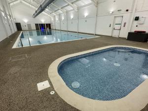Echo Beach - Sleeps 12 - Part of the The Bay Filey Holiday Village with pool, gym and direct beach access, pub, restaurant, tennis and meadows walks