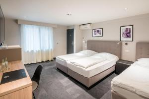 Triple Room room in Hotel Cult Frankfurt City