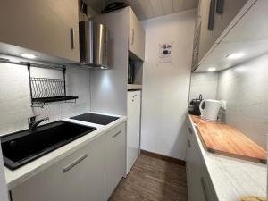 ELAN 19 - Appartement centre village, proche espace aquatique - Parking