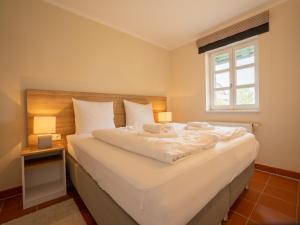 Feriendorf Rugana - Komfortplus Appartement mit 1 Schlafzimmern und Terrasse D46