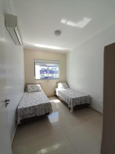 Ap,2 quartos, 500m paria, piscina!