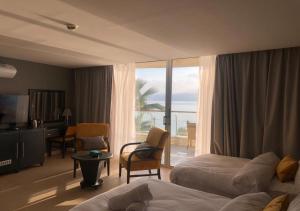 O Beach Hotel & Resort