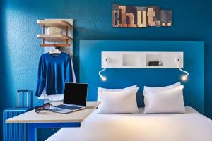 Hotels ibis budget Saint-Ouen-l'Aumone : photos des chambres