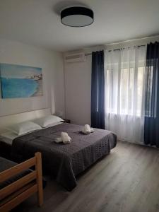 Apartment Dora-100m from the central beach