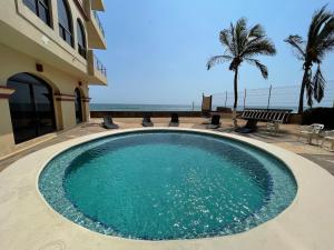 Departamento cómodo a pie de playa by G P S rentas