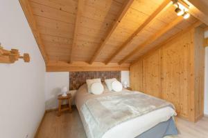 Chalets L’Ecrin Blanc – Cocon familial avec jacuzzi et salle de jeux : photos des chambres