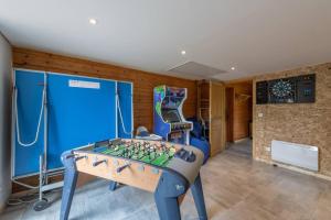 Chalets L’Ecrin Blanc – Cocon familial avec jacuzzi et salle de jeux : photos des chambres