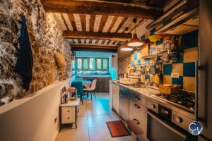 Maisons de vacances Maison de village atypique a 5min du Pont du Gard : Maison 3 Chambres
