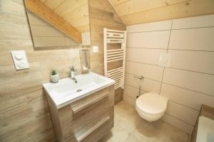 Chalets L'oree des bois, SPA et Sauna : photos des chambres