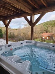 Chalets L'oree des bois, SPA et Sauna : photos des chambres