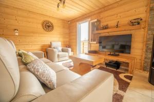 Chalets L'oree des bois, SPA et Sauna : photos des chambres