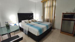 BELLA SUITE frente al Aeropuerto