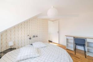 Appartements Le pigeonnier, vue sur les toits : photos des chambres