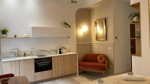 Appartements Home Chic Home - Les Suites de La Comedie : photos des chambres