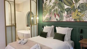 Appartements Home Chic Home - Les Suites de La Comedie : photos des chambres