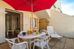 Appartements Ti Kreol - 5 minutes des plages : photos des chambres