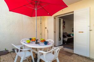 Appartements Ti Kreol - 5 minutes des plages : photos des chambres