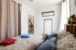 Appartements L'Escale - Centre - Climatisation : photos des chambres