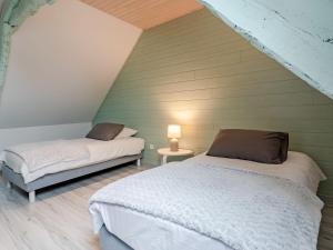 Maisons de vacances Holiday Home La petite maison by Interhome : photos des chambres