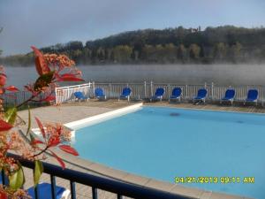 Appartements Appt HAMEAU DU LAC avec piscine et vue sur le lac : photos des chambres