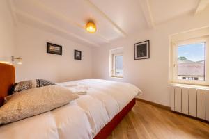 Appartements Les Trois Eveches : photos des chambres