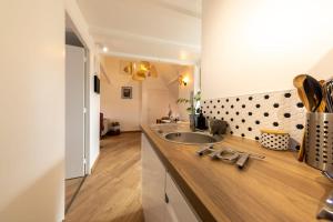 Appartements Les Trois Eveches : photos des chambres