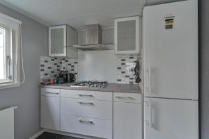 Ruime luxe 4 persoons Chalet midden op de Veluwe