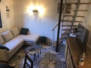 Appartements Le Crotoy en noir et bois : photos des chambres