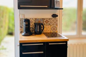 Maisons de vacances La Maison des Plantes, charmante, atypique et cosy pour 4 personnes avec parking et jardin : photos des chambres