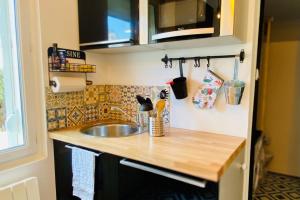 Maisons de vacances La Maison des Plantes, charmante, atypique et cosy pour 4 personnes avec parking et jardin : photos des chambres