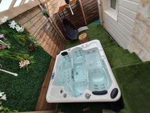 Appartements suite spa jacuzzi tout confort : photos des chambres