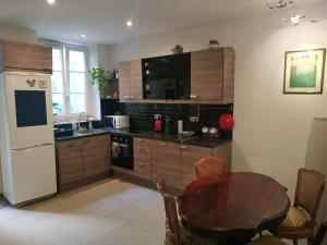 Appartements Maison de ville a 10 minutes de Paris : photos des chambres