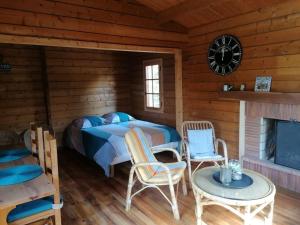 Chalets Chalet en pleine nature au bord d'un etang : photos des chambres