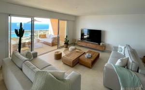 Appartements Paillote Perchee a 180 ° sur la mer : photos des chambres