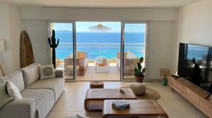 Appartements Paillote Perchee a 180 ° sur la mer : photos des chambres