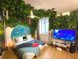 Appartements Le monde D avatar avec Balneo et table de massage : photos des chambres