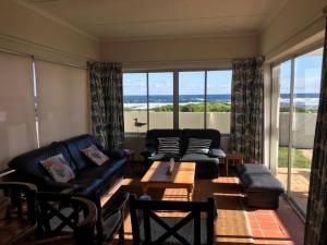 La Mer, a beautiful beachfront home in Sandbaai