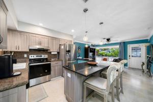 Palm Paradise-Seaside Home w Heated Saltwater Pool