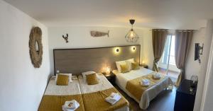 Hotels Hotel Alcyon : photos des chambres