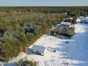 Nowy dom przy starym krześle - w Pelniku